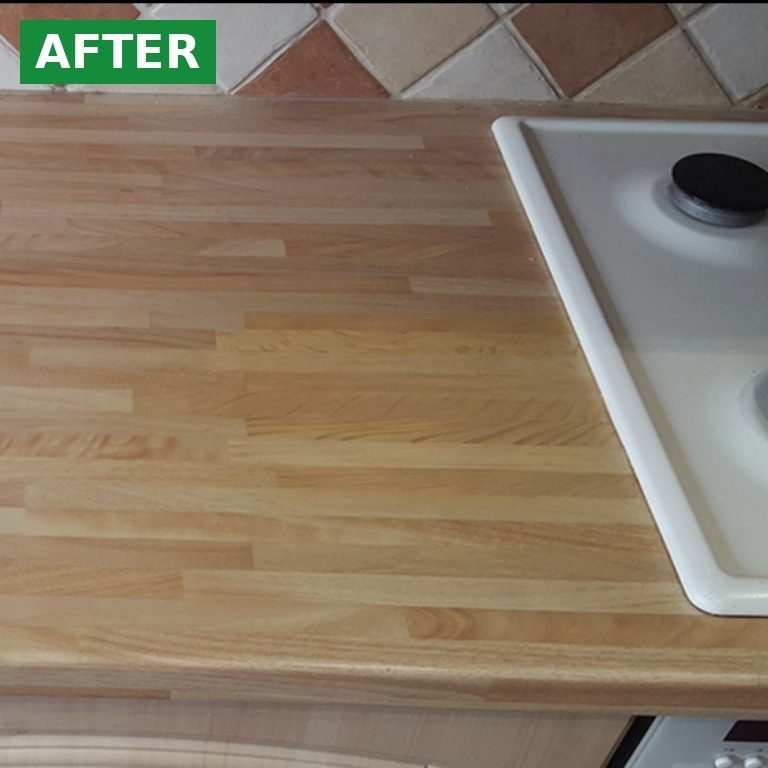 Same worktop, fixed (after) Fixed worktop: Wooden kitchen worktop after burn repair by Repair Hero
